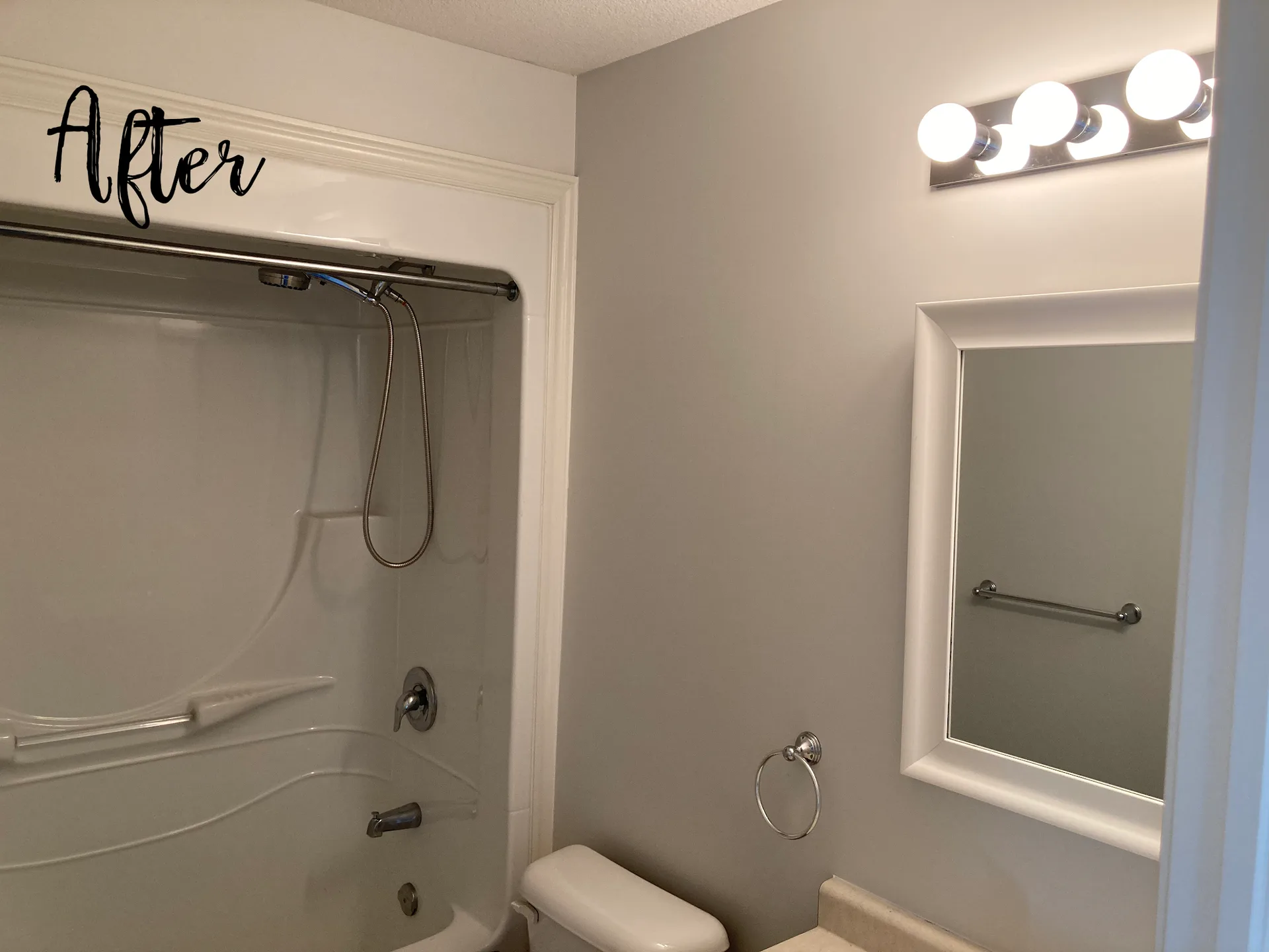 Bathroom with light neutral walls after repainting