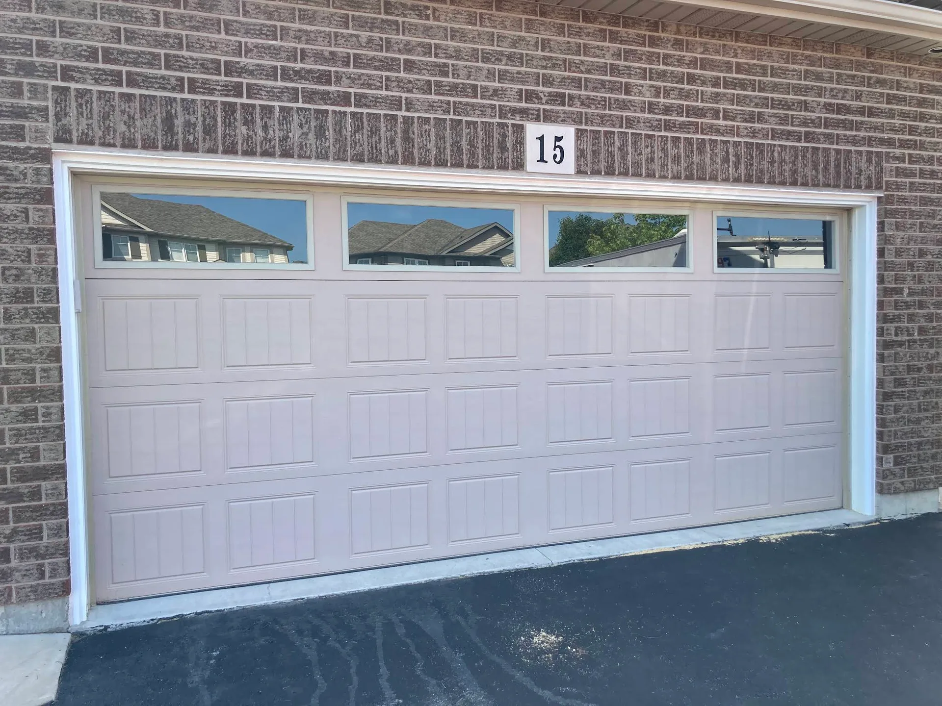Double garage door freshly painted white